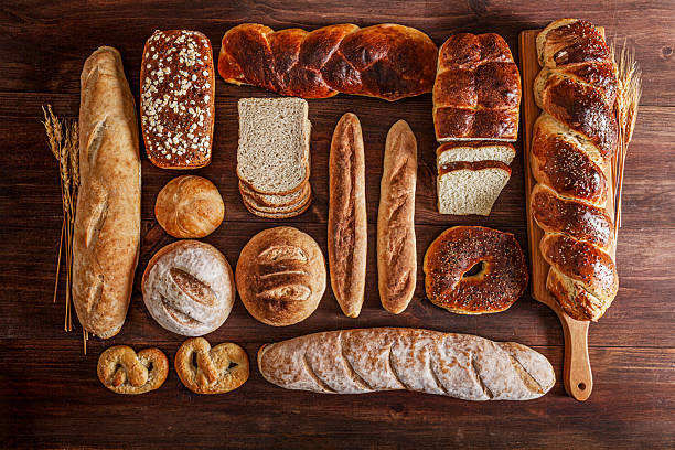 Assortment of bread on rustic wooden table