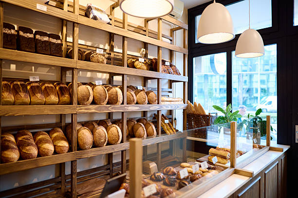 Freshly baked bread on wooden shelves
