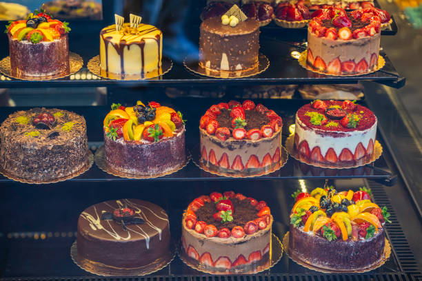 Freshly baked cakes in bakery showcase