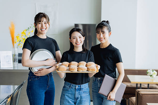 Young women working in a cafe